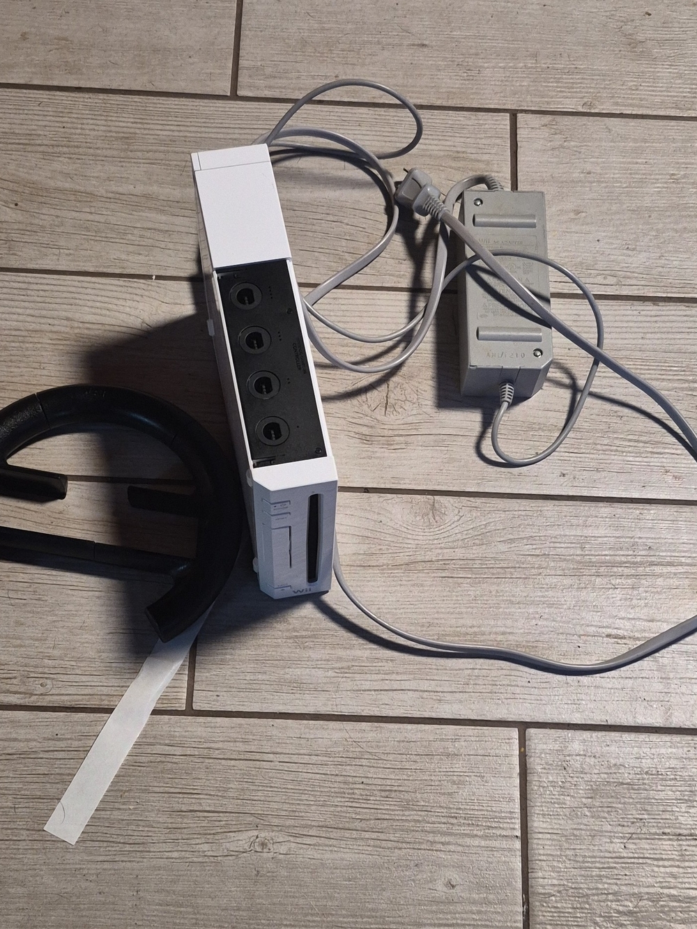 Nintendo Wii Console with Sensor Bar and Power Adapter in White and Black